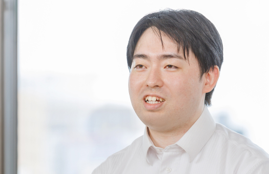 システム管理担当 T.Tさんがインタビューされている